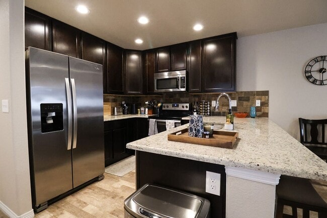 Photo - 3 Bedroom, 2.5 Bathroom Townhome. June 2026 Move-In! 2-year lease option!