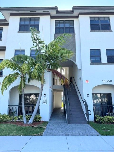 Building Photo - 15650 SW 136th St Unit 101