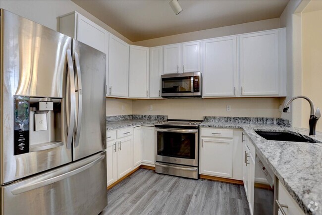 Building Photo - Updated 3bed/2.5bath/2car garage across fr... Rental