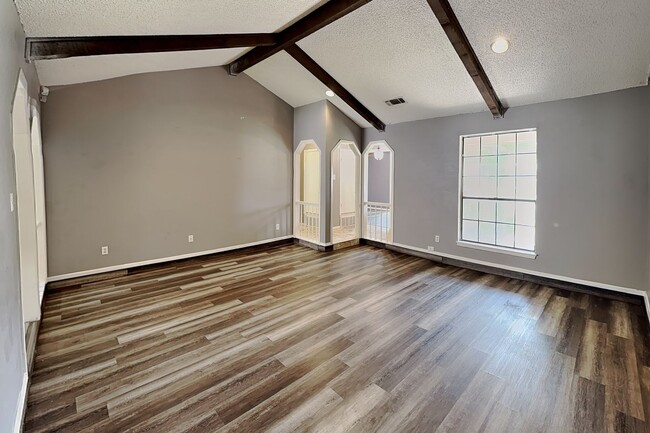 Photo - Darling Fort Worth Duplex! Vaulted Ceilings, Wood Beams & Covered Outdoor Living!