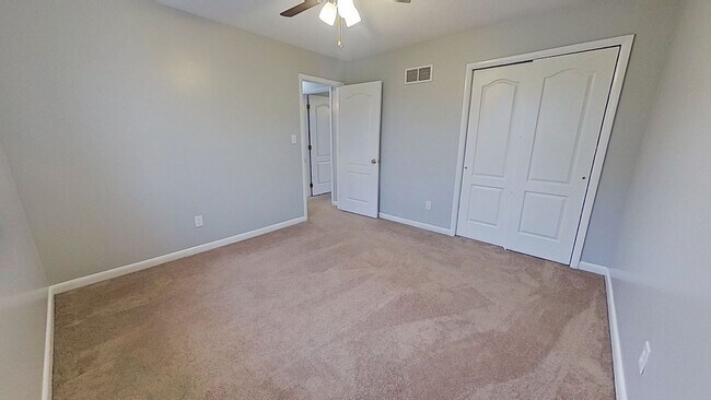 Photo - Move-In Ready 2BR Townhouse w/ Central AC & Off-Street Parking