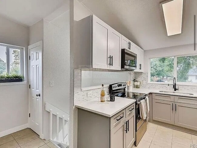 Photo - 7110 E 63rd Ave