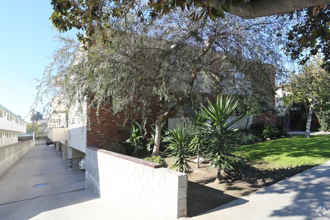 Building Exterior - Parking Area - 3739 Clarington Ave Apartments Unit 26