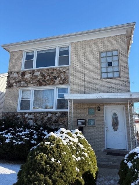 Building Photo - 5619 N Menard Ave Unit 2