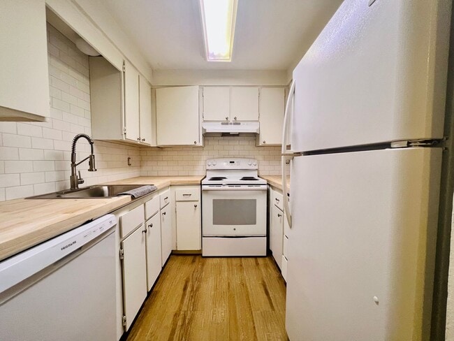 Photo - Spacious Home with Fenced Backyard and gar...