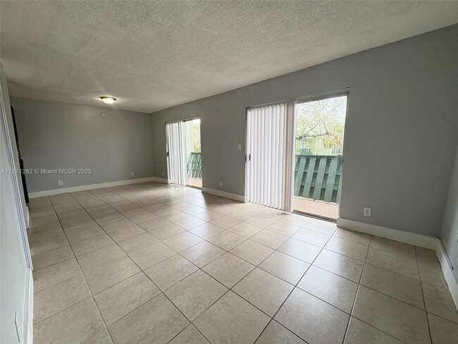 Building Photo - 8913 NW 28th Dr Unit 38 Rental