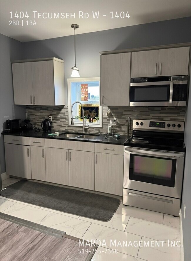 Photo - RENOVATED 2 BED/1 BATH MAIN FLOOR UNIT - WEST END PLUS HYDRO & GAS! Unité 1404