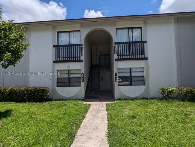 Building Photo - 11777 NW 30th St Unit 206A
