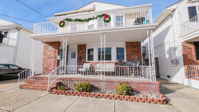 Building Photo - 6903 Ventnor Ave Unit 1