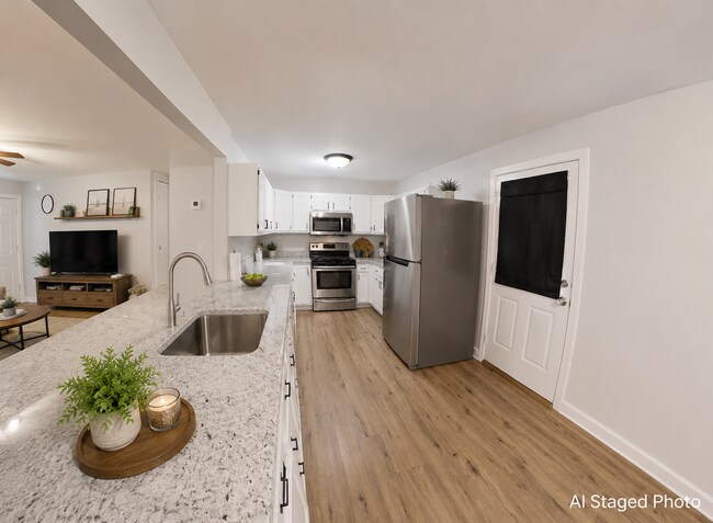 Photo - Large Fenced-in Backyard + Stainless Steel Appliances! Available August 5th!