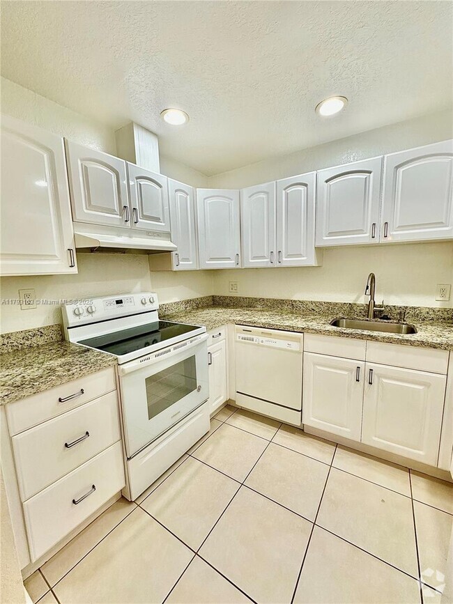 Building Photo - 1220 SW 4th St Unit 1 Rental
