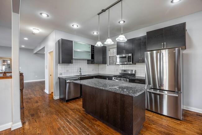 Building Photo - 3444 W Schubert Ave Unit 1 Rental
