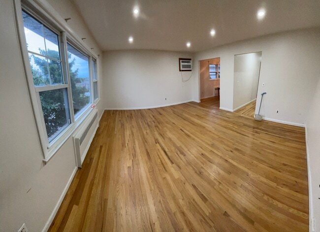 Building Photo - 8412 Liberty Ave Unit 2