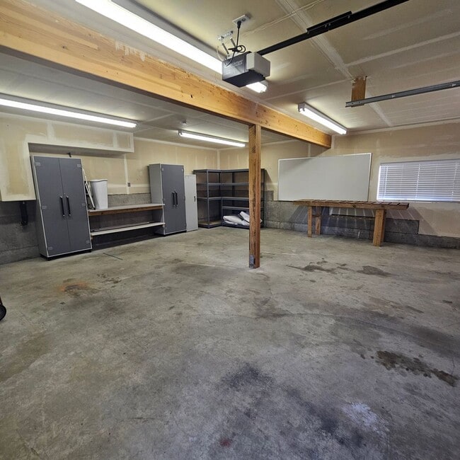 Photo - Charming 1-Bedroom Home with Spacious Backyard, 2 car garage & Modern Amenities – Pet Friendly!