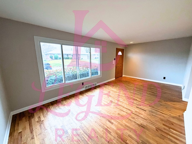 Photo - Charming 3-Bedroom Home with Hardwood Floors, Updates & Fenced Yard.