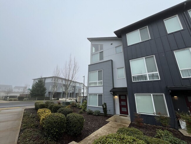 Photo - Three-Level Townhome with Island Kitchen, Bonus Room, Balcony & Attached Garage