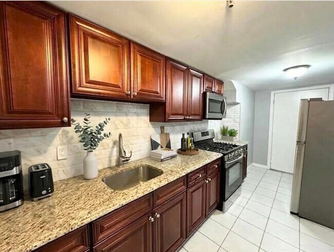 Building Photo - 321 64th St Unit G