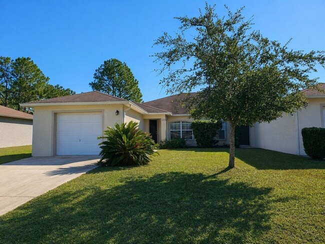 Building Photo - $1550 - 3/2/1 - Palm Coast Duplex - Great Location