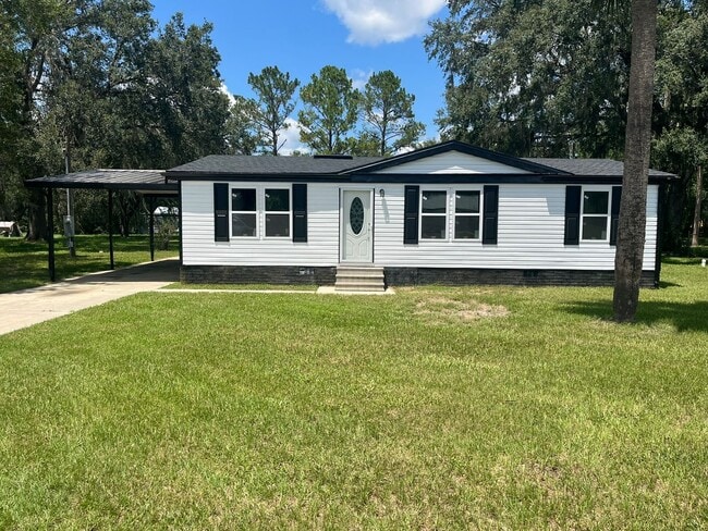 Building Photo - 3/2/1 on over 1/2 Acre Rental