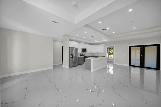 Photo - Brand-New Home in Lehigh Acres – Move-In Ready! FL 33974. Qualify for a deposit-free option and s...