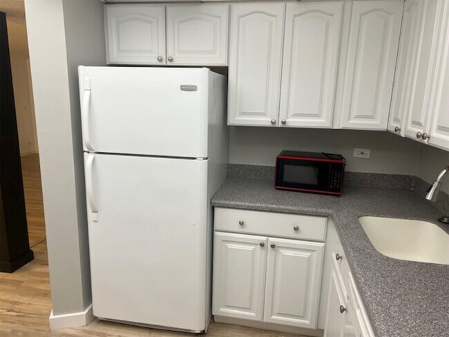 Photo - 3720 Inverrary Dr Unit 1T