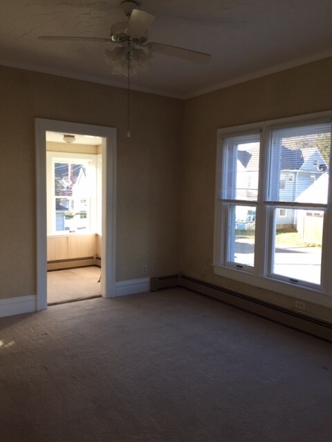 Living room into reading room - 100 Park Ave Unit 1