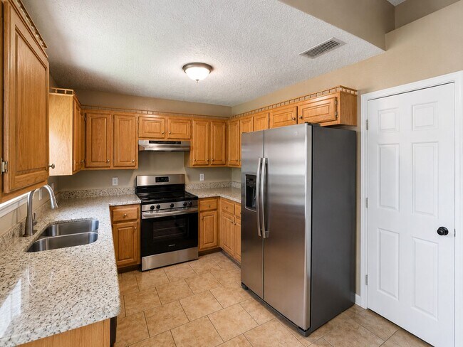 Photo - 4-Bedroom Home with Spacious Backyard in Stratford Estates