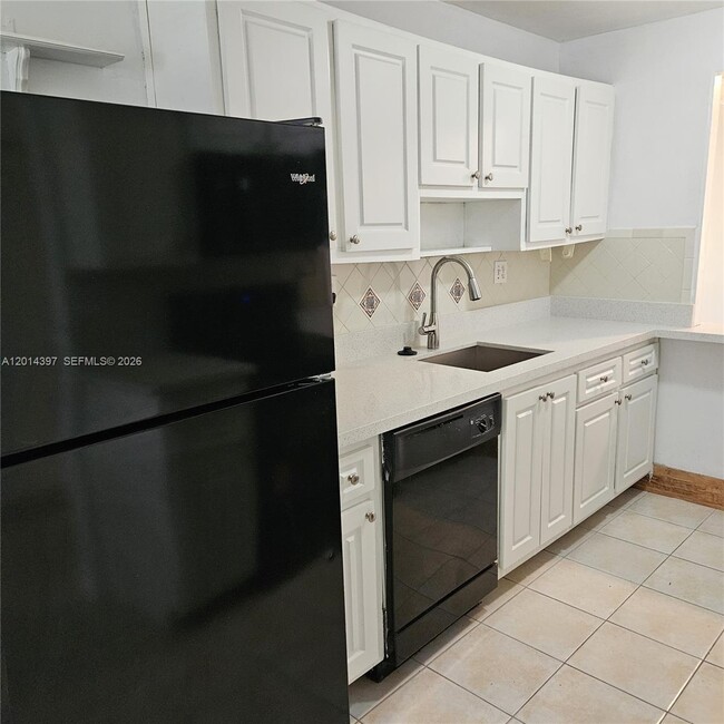 Building Photo - 3070 NW 48th Terrace Unit 104