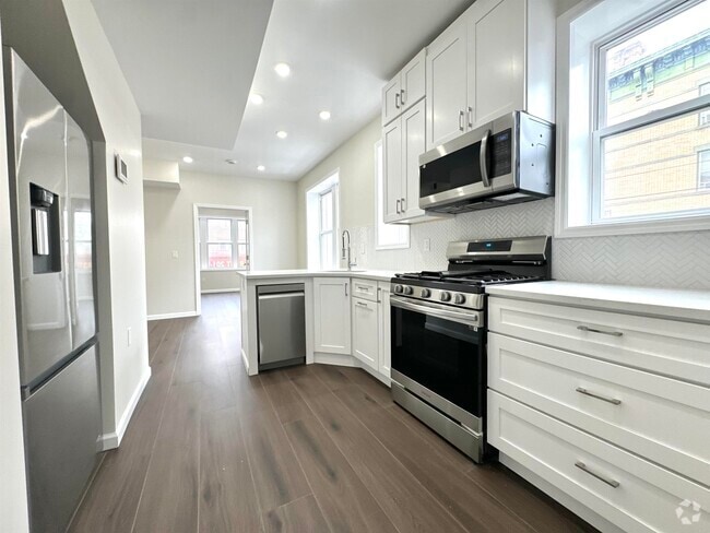 Building Photo - 565 West Side Ave Unit 2 Rental