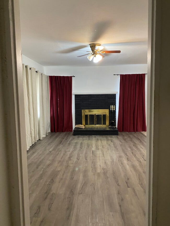 LIVING ROOM WITH FIREPLACE - 45127 Division St