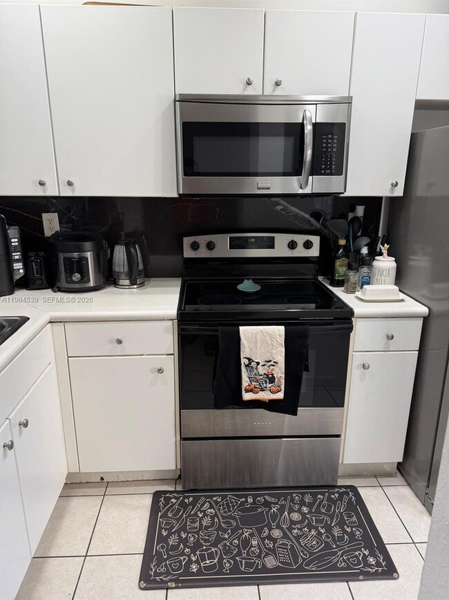 Building Photo - 5755 NW 115th Ct Unit 107