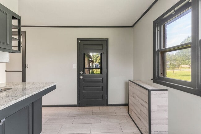 Photo - Newly renovated home with a large yard per...