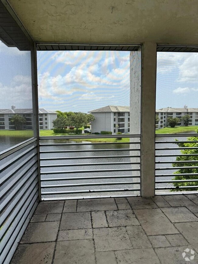 Building Photo - 9420 Poinciana Pl Unit #406 Rental
