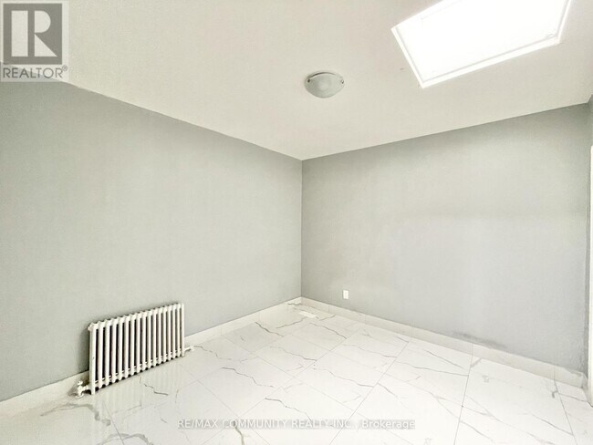 Photo - 2624 Eglinton Ave E Unit 2