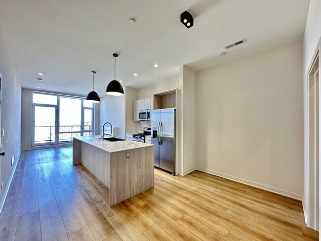 Building Photo - 6324 W Belmont Ave Unit J05P