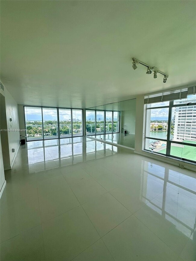 Building Photo - 5750 Collins Ave Unit 10F Rental