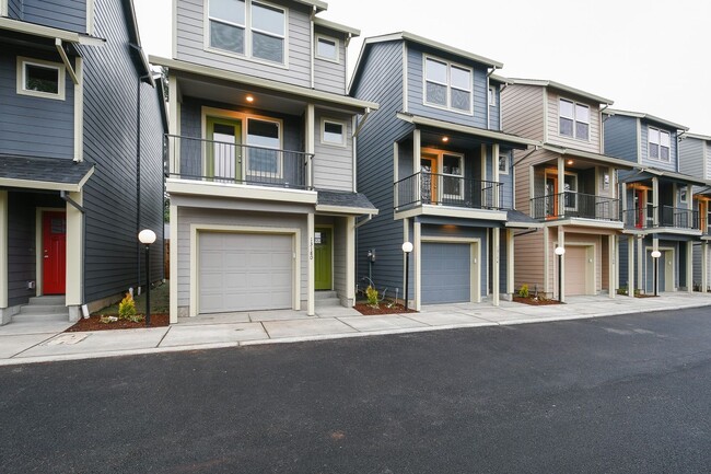 Photo - Three-Bedroom Home with Updated Kitchen & Vaulted Ceilings