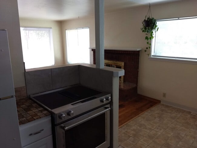 kitchen open to DR - 1506 S Denver Ave