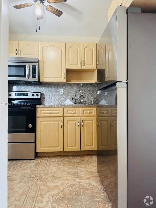 Building Photo - 1735 W 60th St Unit M305 Rental