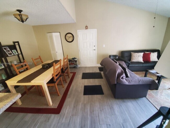 Building Photo - 15540 SW 80th St Unit D-205 Rental