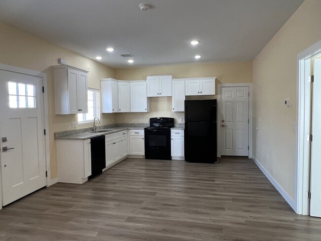 Photo - Dual Primary Suites & 2 car Garage Unit 2
