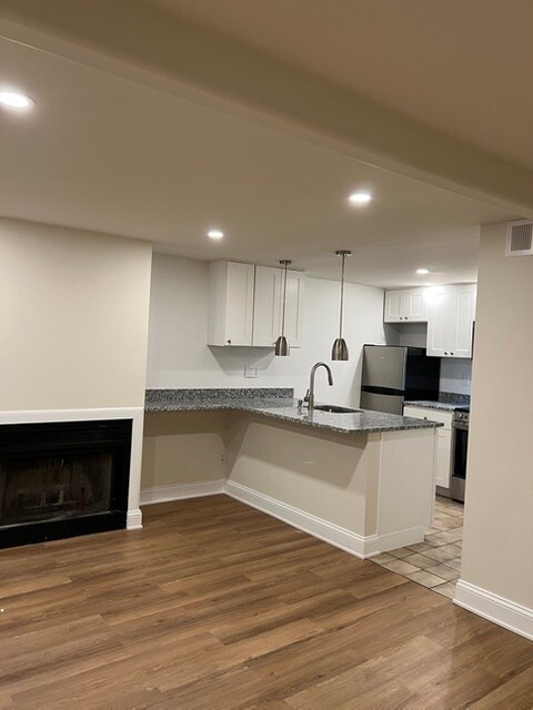 Kitchen bar and fireplace - 1735 1/2 T St NW Unit 1735 1/2 T Street