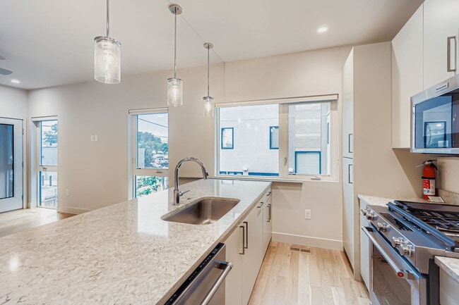 Building Photo - NOT Your Typical 1BR – New, Private Garage... Rental