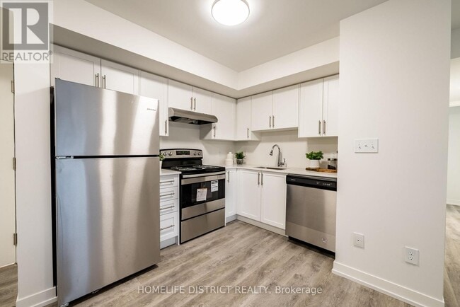 Photo - 976 Simcoe St N Unit 202