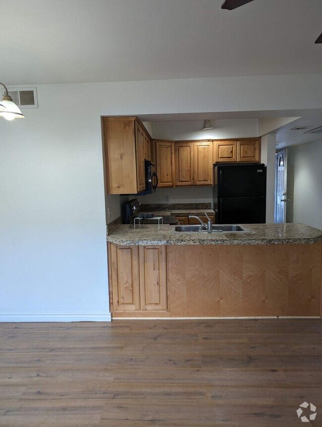 Building Photo - Newly Remodeled One Bedroom/ One Bath Condo Unit 10 243