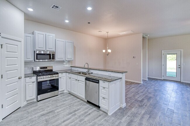 Photo - Brand New Construction! Lawn care provided!