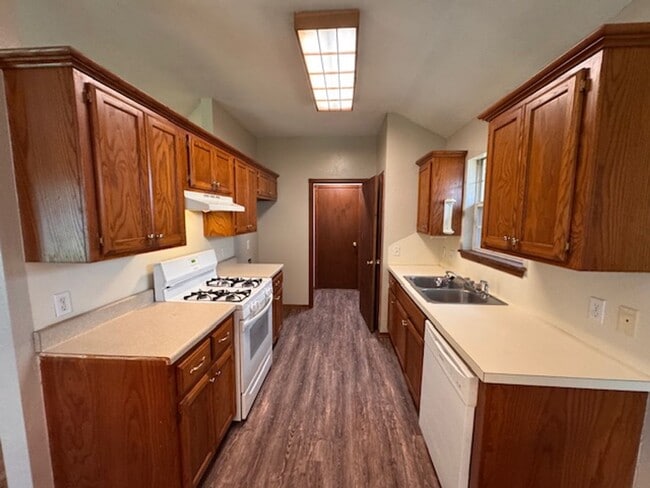 Photo - Brand new Luxury vinyl Plank in living, Kitchen and dining, new paint, 3 bed 2 bath 2 car in Must...