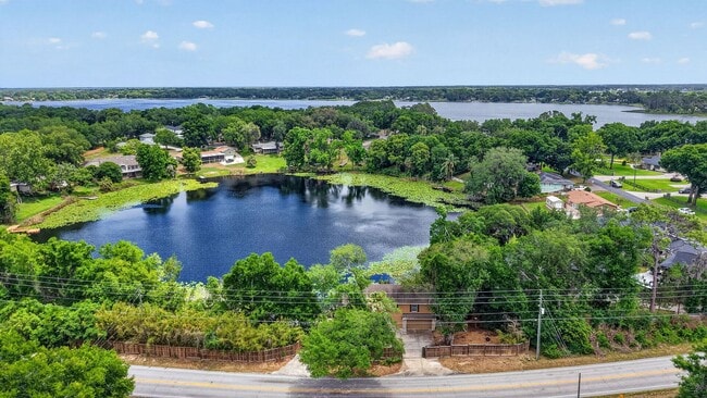 Photo - Available Now! Waterfront Living at Its Best – Pool, Decks & Gated Privacy