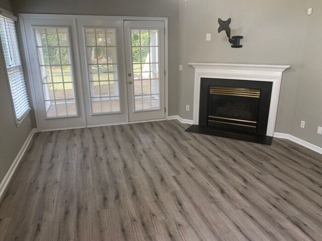 Photo - Spacious 3-bedroom home located in Charlotte. $300 off on two months' rent!