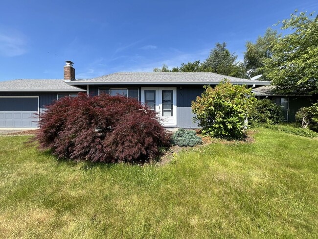 Photo - Charming Ranch Home with Sunroom or 4th Bedroom, Two-Car Garage and Fenced Backyard